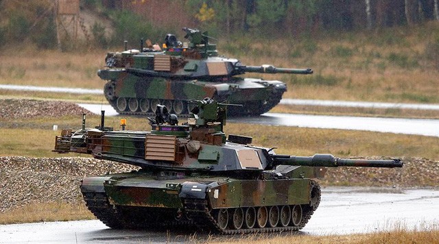 Mỹ đưa hàng trăm loại vũ khí tới châu Âu để đề phòng Nga Xe tăng của Mỹ (Ảnh minh họa: Reuters)