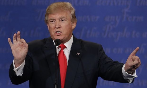 Trump tuyên bố gác việc kinh doanh để tránh 'xung đột lợi ích' Trump tuyên bố sẽ dành toàn thời gian và tâm trí cho vai trò tổng thống. Ảnh: AP