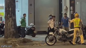 Drunk man kicked off a special traffic police motorbike 