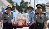 Truy điệu, an táng hài cốt 14 liệt sĩ hy sinh tại Lào và Campuchia 