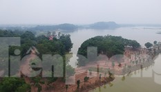 Dự án 'xẻ thịt' hồ Đồng Mô vẫn đổ đất thi công trong quá trình thanh tra