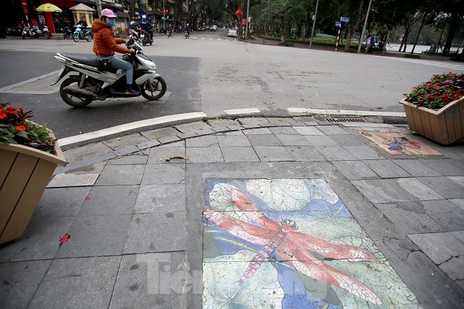 Bức tranh nghệ thuật trên nắp cống, hố ga ở Hà Nội - ảnh 10