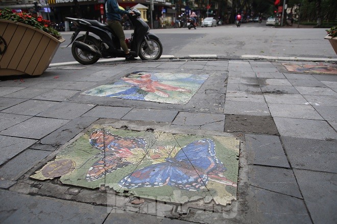 Bức tranh nghệ thuật trên nắp cống, hố ga ở Hà Nội - ảnh 6