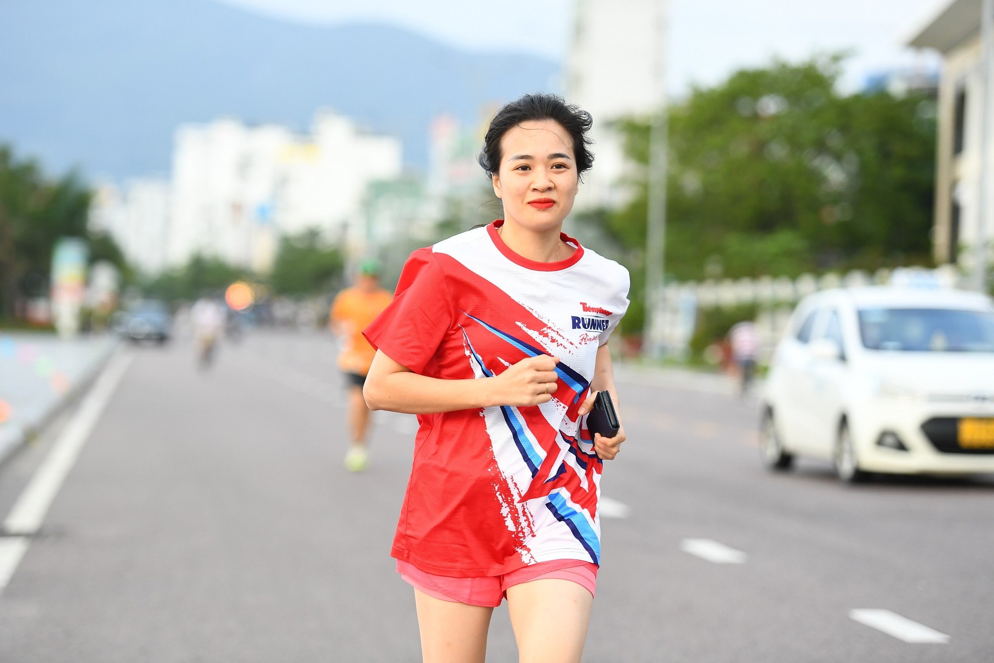 Gần 100 Tiền Phong Runner chinh phục cung đường biển Quy Nhơn, chào mừng 70 năm báo Tiền Phong xuất bản số đầu tiên ảnh 24