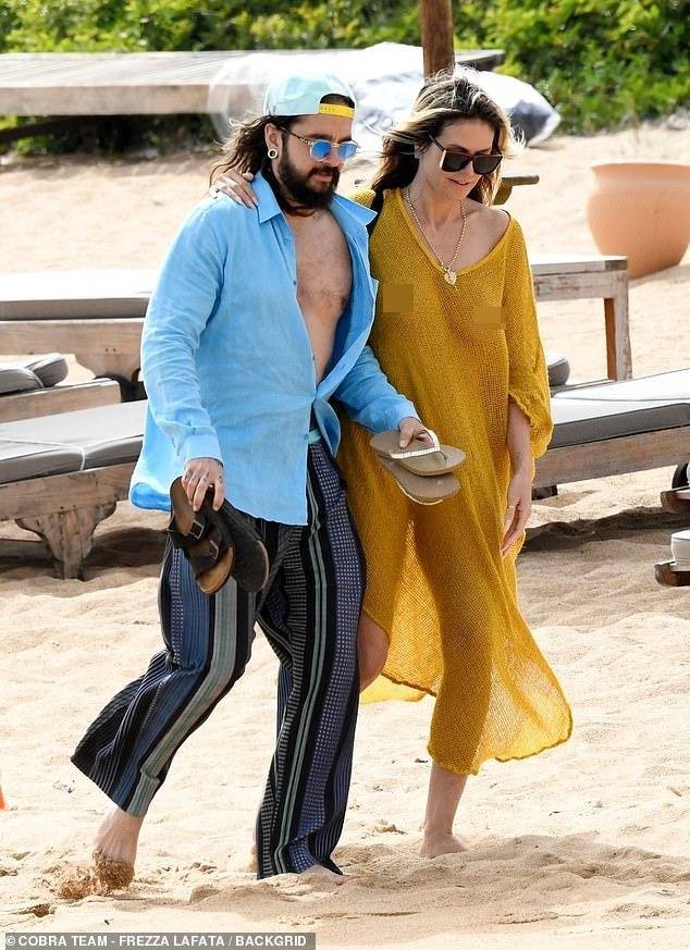 Heidi Klum cởi bikini để tắm nắng gây tranh cãi ảnh 15
