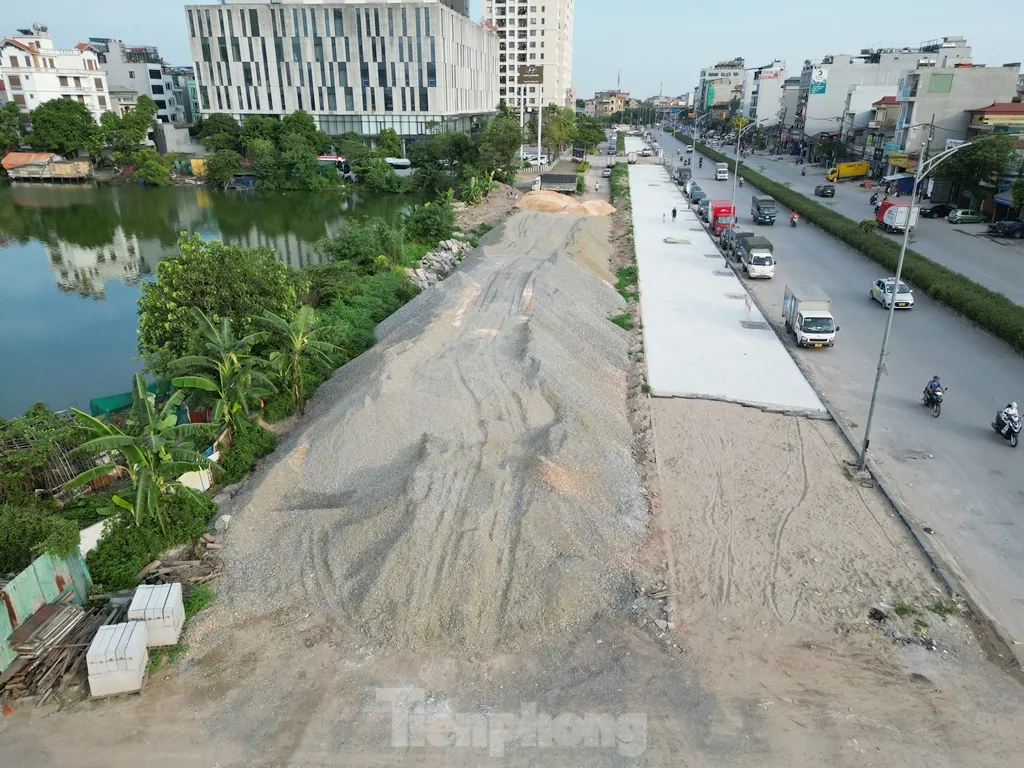 Tiếp tục lùi thời hạn hoàn thành dự án mở rộng đường Tam Trinh ảnh 1