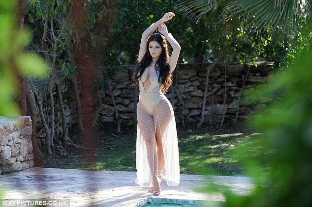 Demi Rose 'burns the eyes' of fans again with a see-through dress showing off her blooming curves photo 4