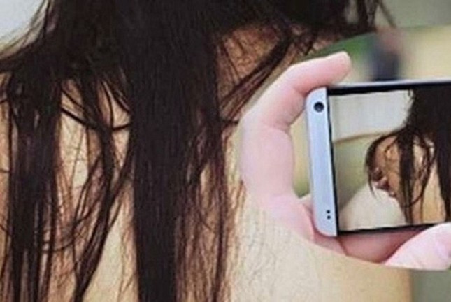 Xông vào nhà nghỉ quay clip người tình quan hệ với người đàn ông khác rồi tống tiền ảnh 1