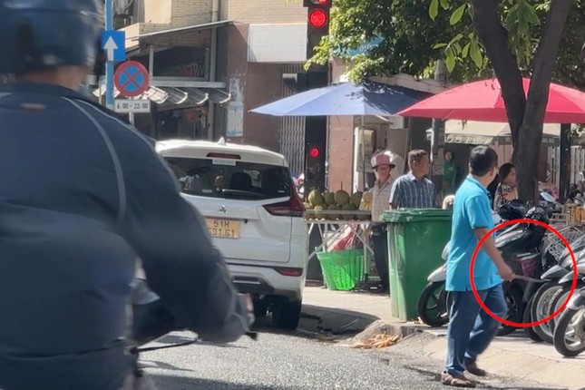 Điều tra vụ tài xế taxi công nghệ cầm dao rượt khách ở TPHCM ảnh 1