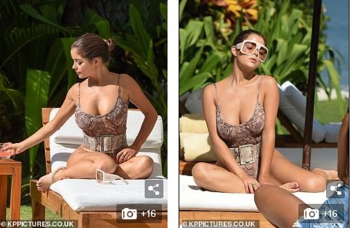 Lingerie model Demi Rose poses seductively for photos, showing off her eye-catching chest in photo 9