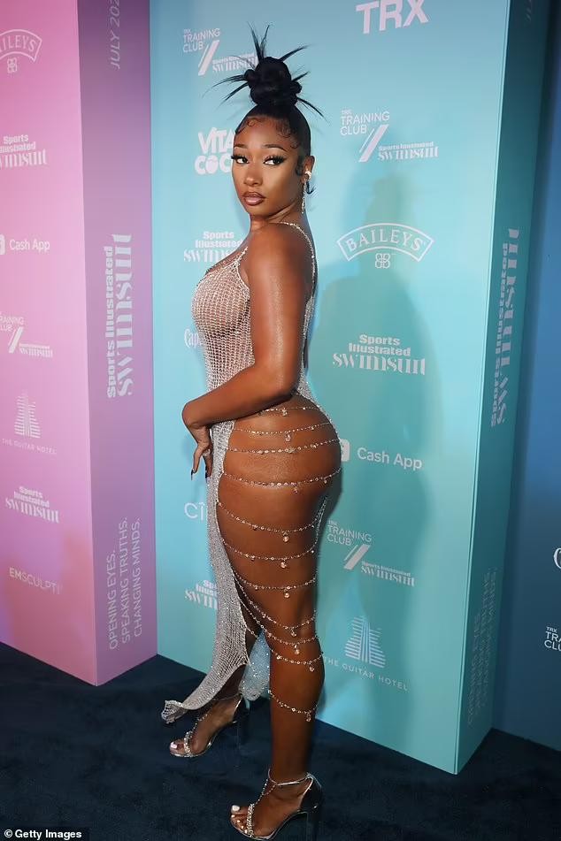 Megan Thee Stallion wears a mesh dress that reveals her underwear, showing off her sexy butt in photo 3