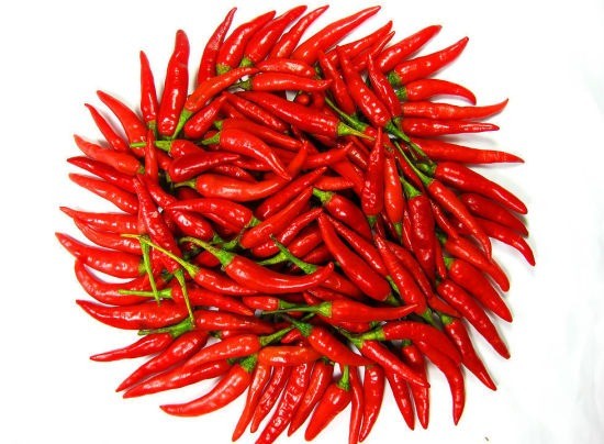 Nhiều người đặc biệt thích ăn cay mà không ngờ tới có thể gặp những tác hại nguy hiểm này ảnh 1