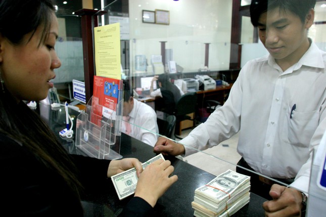 Ngân hàng Nhà nước tăng tỷ giá USD lên 22.957 đồng ảnh 1