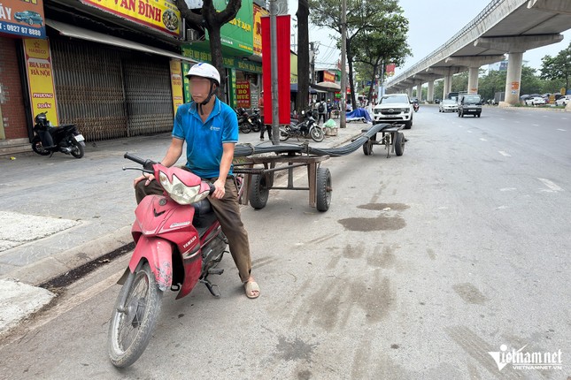 Tài xế kéo xe sắt dài 12,7m bị cảnh sát phạt, chủ cửa hàng &apos;than&apos; bỏ nghề ảnh 1