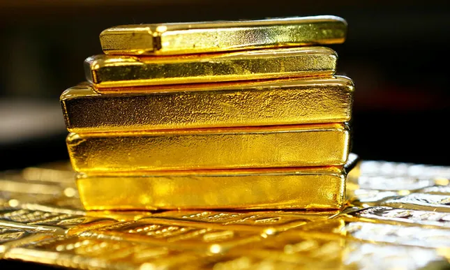 Giá vàng thế giới bật tăng, chứng khoán suy yếu ảnh 1