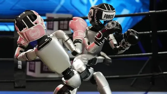Lần đầu tiên robot như người thật thi đấu quyền anh ảnh 1