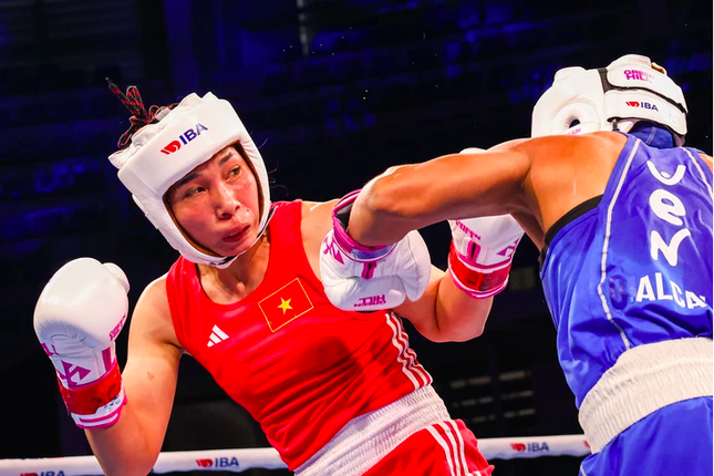 Bà mẹ hai con quả cảm Hà Thị Linh giành huy chương đồng boxing thế giới ảnh 1