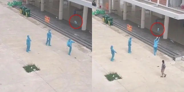 Giây phút thư giãn hiếm hoi: Nhân viên chống dịch mặc nguyên đồ bảo hộ chơi đá cầu ảnh 2