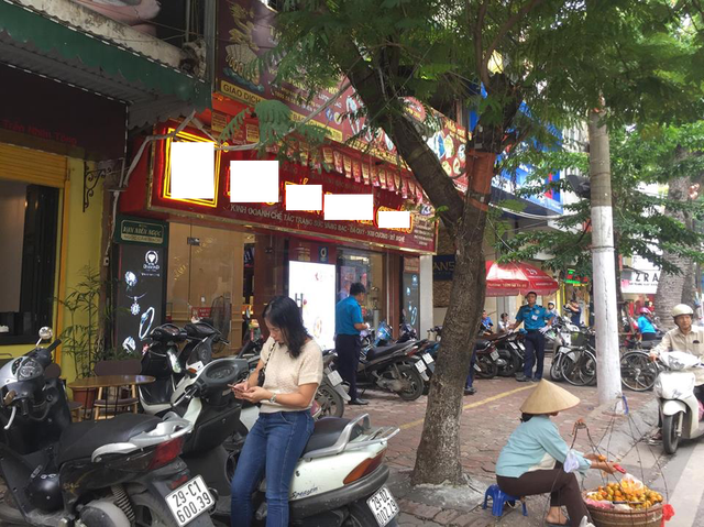 Hà Nội: Sợ bị phạt, nhiều người bỏ ngủ trưa tìm chỗ đổi USD ảnh 2