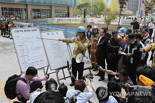 Cháy trung tâm mua sắm, 34 người thương vong - ảnh 1