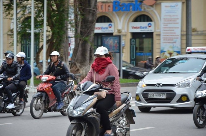Nhiệt độ giảm sâu, người Hà Nội 'thưởng thức' gió lạnh mùa Đông - ảnh 5