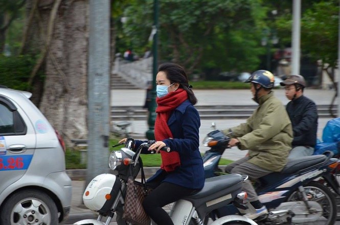 Nhiệt độ giảm sâu, người Hà Nội 'thưởng thức' gió lạnh mùa Đông - ảnh 16