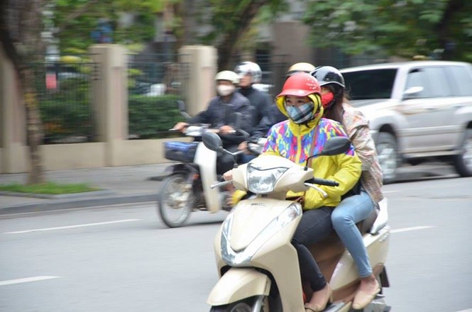Nhiệt độ giảm sâu, người Hà Nội 'thưởng thức' gió lạnh mùa Đông - ảnh 13
