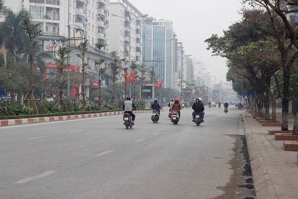 Đường phố Hà Nội vắng vẻ ngày đầu năm mới 2017 - ảnh 6