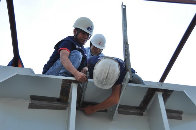 Công nhân xây dựng Cầu Vàm Cống làm việc xuyên Tết - ảnh 7