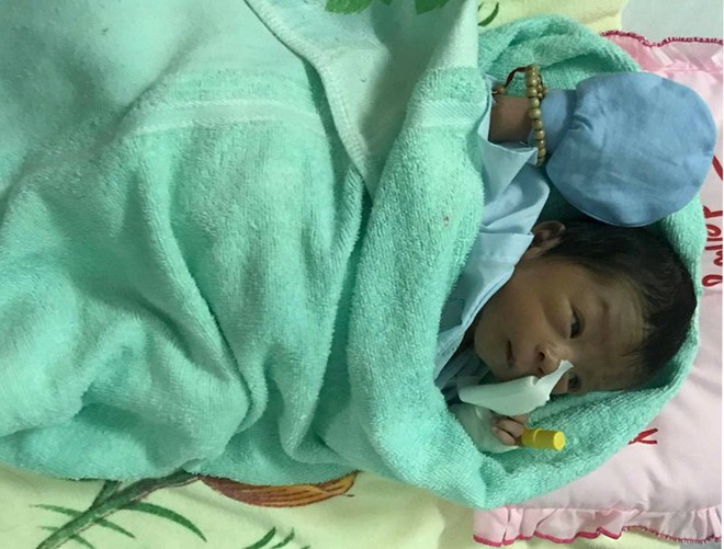 Bé trai sơ sinh bị chôn sống: Khi được bế lên bé cất tiếng khóc - ảnh 2