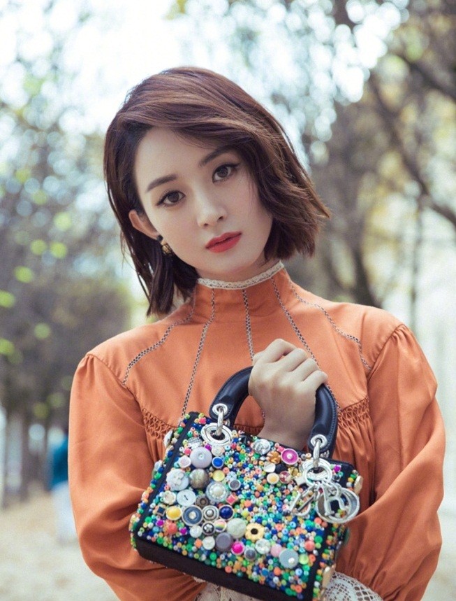 Angelababy diện váy mỏng manh giữa trời đông - ảnh 11