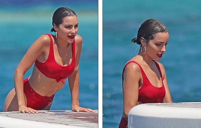 Hoa hậu Hoàn vũ 2012 Olivia Culpo mải mê tạo dáng với bikini đỏ rực - ảnh 1
