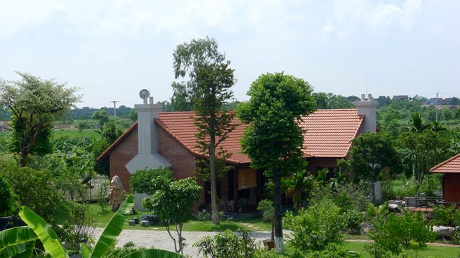 Biệt thự núp bóng 'nhà tạm' trên đất V.A.C - ảnh 1