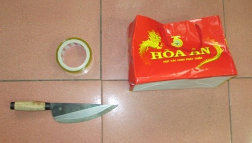 Vây bắt tên cướp chém vợ chồng chủ cửa hàng điện thoại - ảnh 1