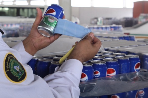 Bắt giữ 48.000 lon bia Heineken 'khoác áo' Pepsi để nhập lậu - ảnh 2