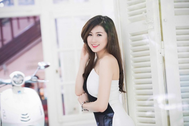Á hậu Tú Anh quyến rũ với váy đen-trắng đối xứng - ảnh 9