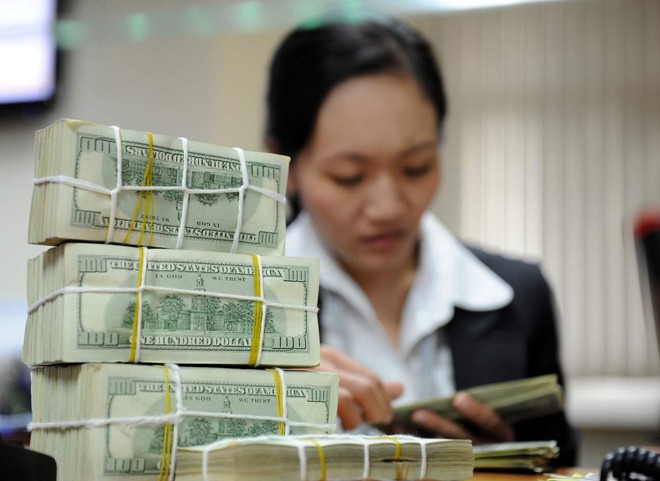 Người Việt gửi bao nhiêu tiền ở nước ngoài? - ảnh 1