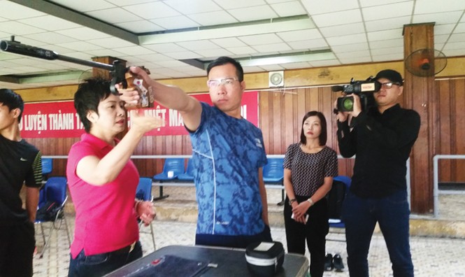 Xạ thủ Hoàng Xuân Vinh sau ánh hào quang - ảnh 1