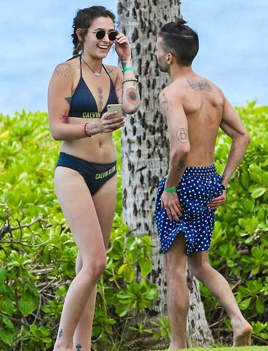 Con gái 19 tuổi của Michael Jackson lộ đầy hình xăm khi mặc bikini - ảnh 4