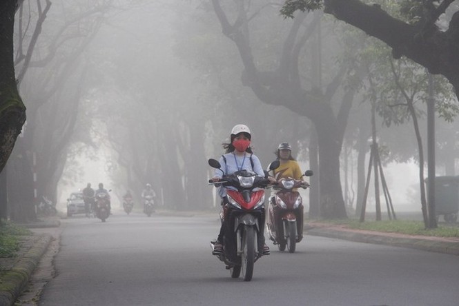 Thành phố Huế chìm trong sương mù - ảnh 10