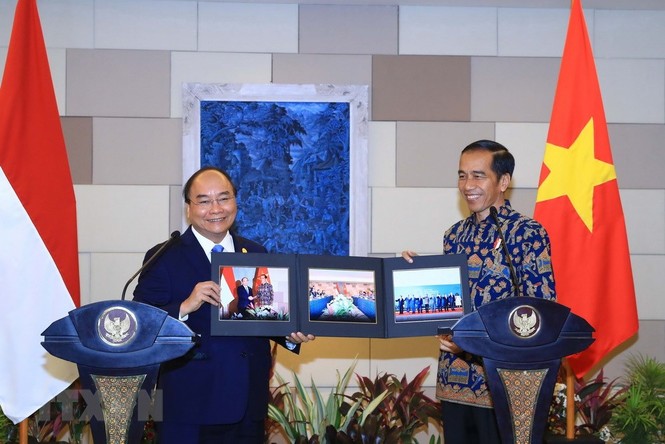 Hình ảnh Thủ tướng Nguyễn Xuân Phúc hội đàm với Tổng thống Indonesia - ảnh 4