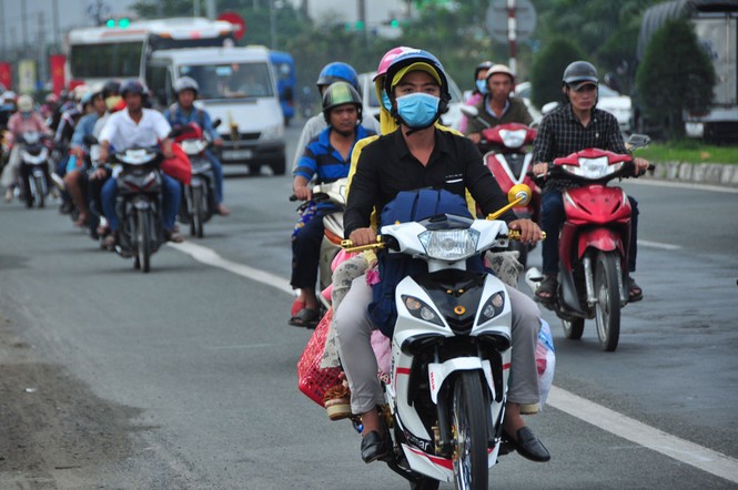 Dân miền Tây trở lại Sài Gòn làm việc đầu năm mới - ảnh 7