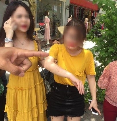 Nghi nổ súng vào cửa hàng quần áo, một cô gái bị thương - ảnh 1