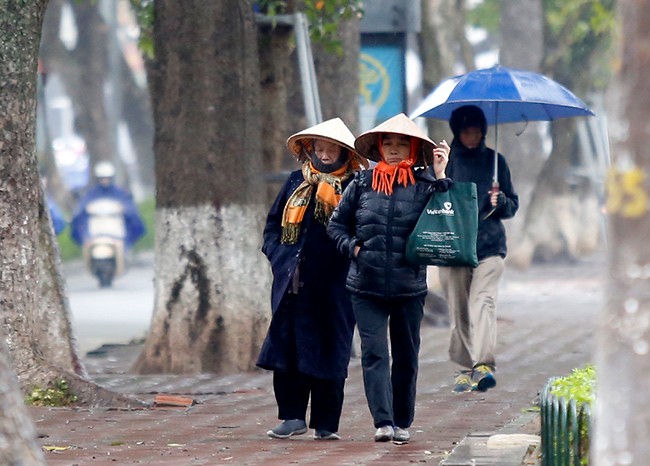 Hà Nội rét nhất từ đầu đông, cuộc sống người dân đảo lộn - ảnh 10