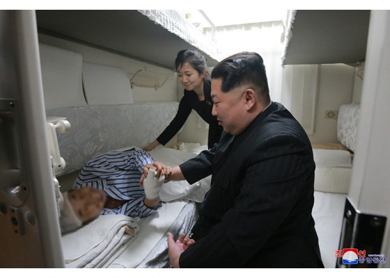 Ông Kim Jong-un tiễn đoàn tàu chở thi thể nạn nhân Trung Quốc về nước - ảnh 3