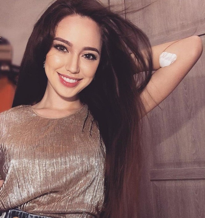Bà xã tuyển thủ Nga đẹp tựa ‘tiên nữ giáng trần’ - ảnh 6