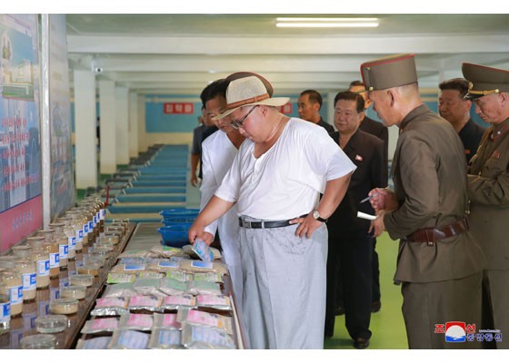 Thăm trại cá, ông Kim Jong-un khen cá trê nhìn giống… thỏi vàng - ảnh 10