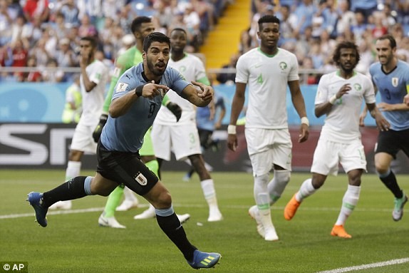 Suarez lập công, Uruguay sớm lấy vé vòng 1/8 World Cup - ảnh 11