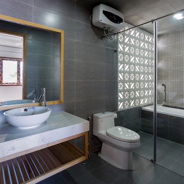 Nhà cho nữ độc thân đẹp mê ly ở Đà Nẵng được báo nước ngoài ca ngợi - ảnh 9