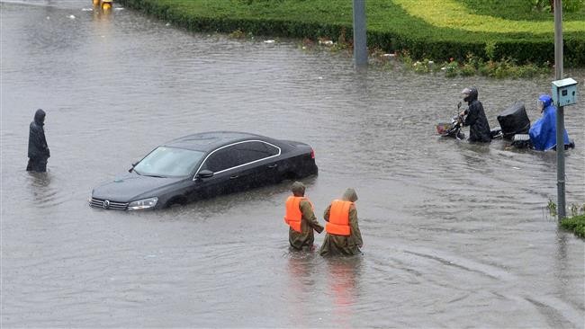 Lũ lụt kinh hoàng ở Trung Quốc, 75 người thiệt mạng và mất tích - ảnh 3